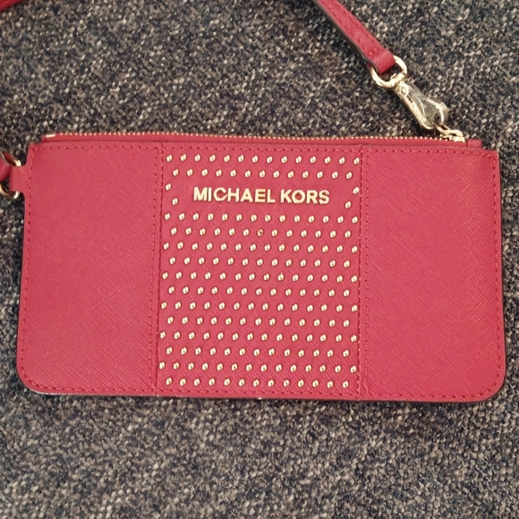 Michael Kors Handbags - Michael Kors wristlet, never used, red, 4" x 7"